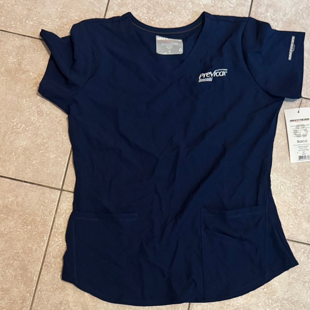 NWT women’s scrub top